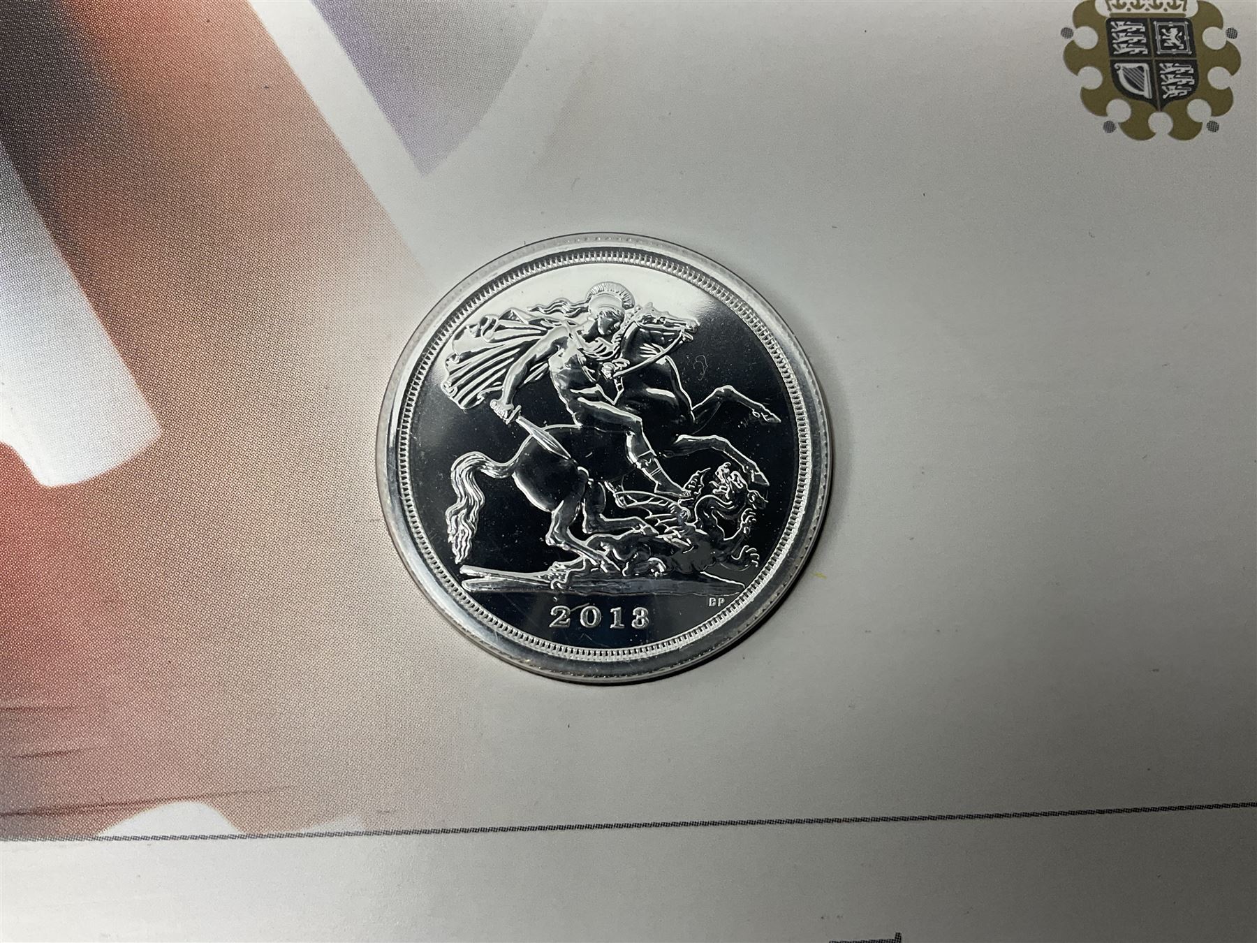 Queen Elizabeth II 2017 one ounce fine silver Britannia coin, The Royal Mint 2013 fine silver twenty pound coin on card, King George VI 1945 halfcrown and King George V 1916 halfcrown