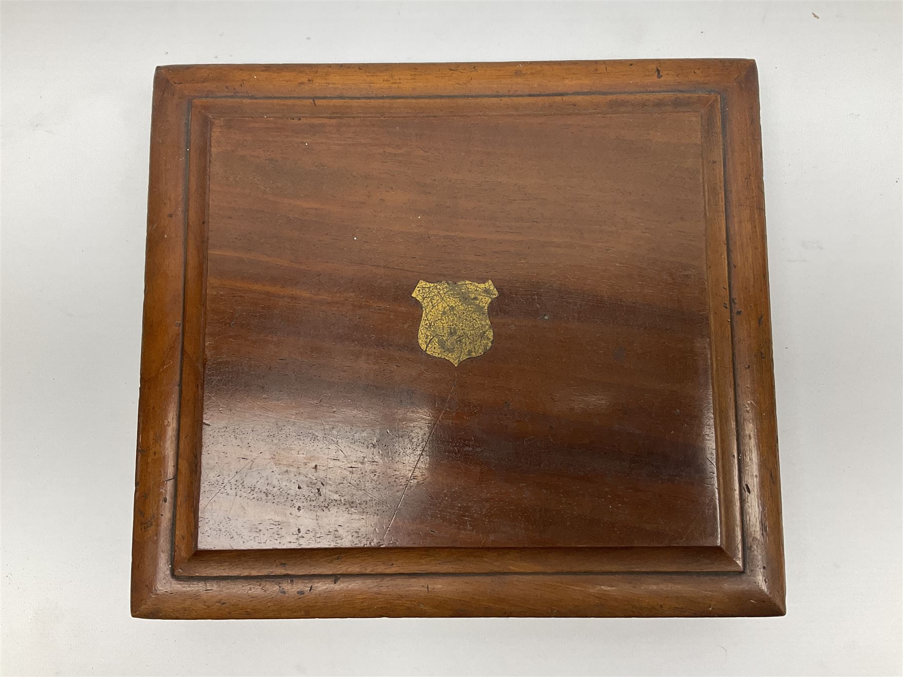 Victorian silver plated dessert set by Elkington & Co for twelve place settings, each reeded handle with vacant cartouche, each with Elkington & Co mark, date letter for 1861, and registration lozenge, contained within a mahogany case with vacant brass cartouche to the hinged cover, opening to reveal a Royal blue baize lined interior with removable tray, case H6cm W29.5cm D26.5cm