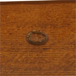 Acornman - 5' adzed oak dining table, rectangular top above a trestle base united by a stretcher with carved acorn signature, by the workshop of Alan Grainger of Brandsby