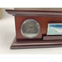 Danbury Mint 'The Ultimate James Bond Collection' comprising stamps and coins housed in a display case, 'Concorde Queen of the Skies' sculpture, stamps, medallion display and 2020 'Centenary of the Unknown Warrior' five pound coin cover in Harrington and Byrne folder
