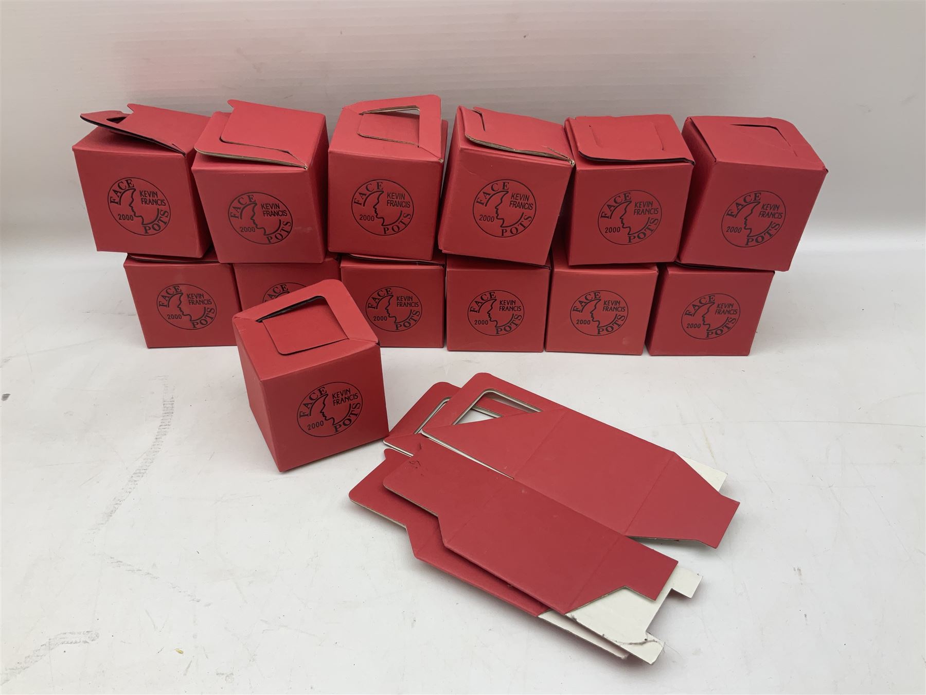 Fifteen Face Pots by Kevin Frances, all of music interest, to include the Beatles; Paul 'Kookoocachu', 'Love Is All You Need', 'Octopus's garden', 'While My Guitar Gently Weeps', 'All You Need Is Love' and 'Everybody's talking and no one says a word', Elton John; I'm still standing, Buddy Holly; 'That will be the day', David Bowie 'We can be heroes' , Mick Jagger prototype colour type etc, all boxed  