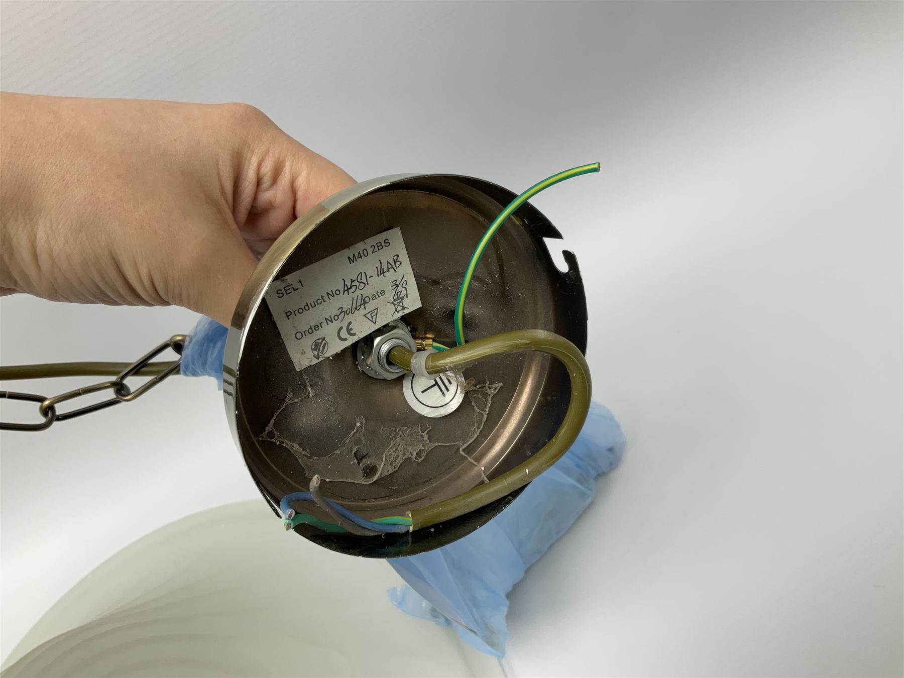 Three frosted glass light fittings with brushed metal mounts, approx L30cm excl fitting