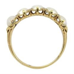 Early 20th century gold five stone split pearl ring with diamond accents set between