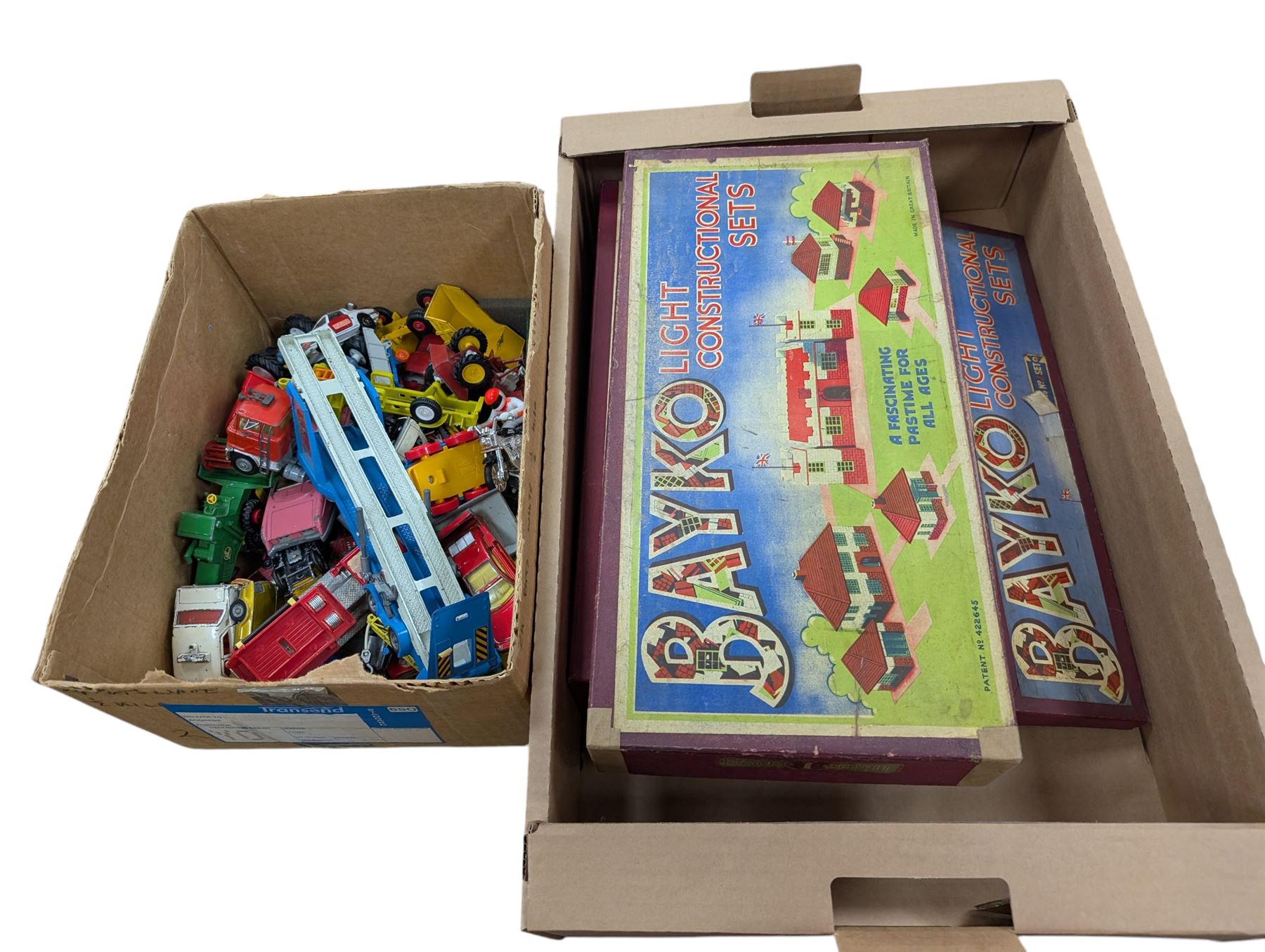 Bako construction kits and a collection of loose diecast vehicles