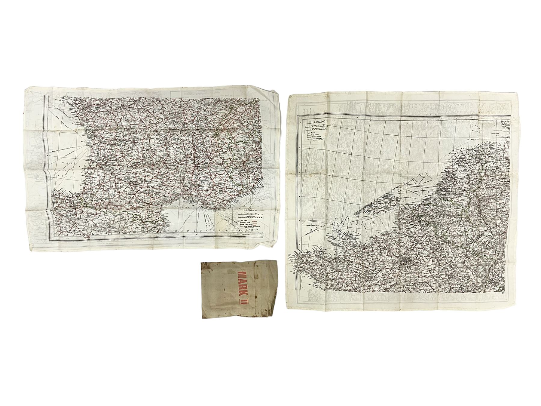 Two WW2 double sided silk escape and evade maps of Europe, comprising: Germany, Belgium, France, Holland, Spain etc,  in canvas envelope stamped Mark II