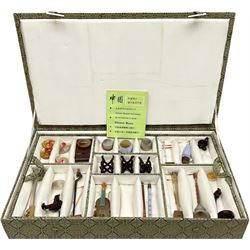 Chinese boxed collection of miniature polished hardstone musical instruments with hardwood stands