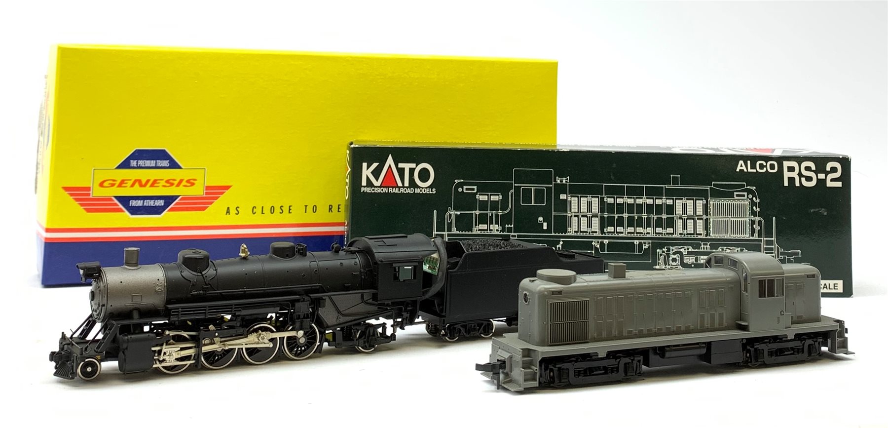 HO scale - Athearn Genesis G9010 USRA 2-8-2 locomotive; and Kato Alco RS2 37-2100 locomotive with unopened sprue parts for completion, both undecorated mint and boxed with paperwork (2)