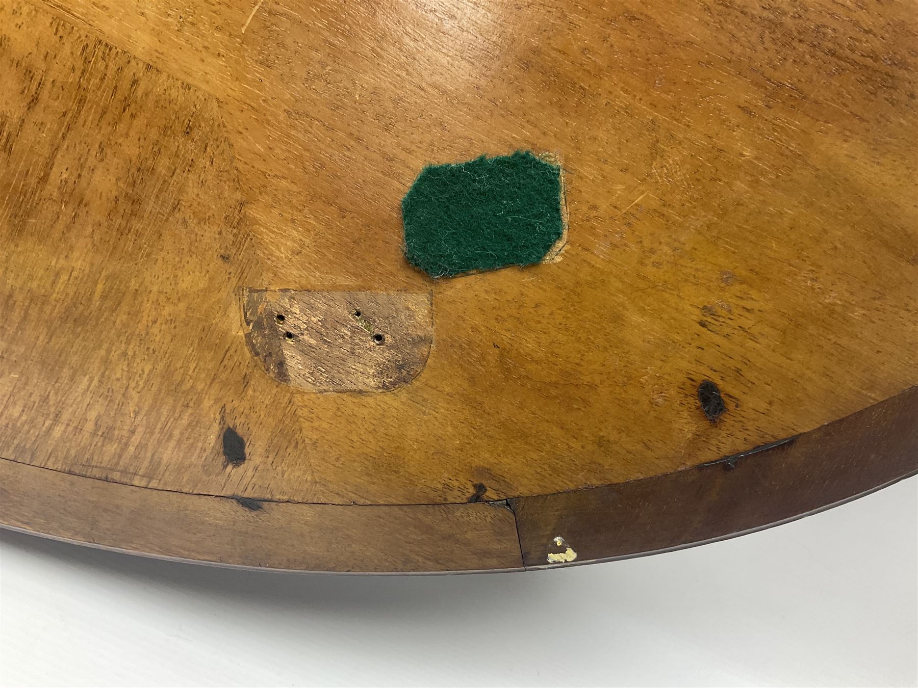 Late 19th/early 20th century mahogany and marquetry inlaid tray, of oval form with twin scrolled handles and moulded border, the central panel inlaid with figures seated at a table drinking tea, L99cm
