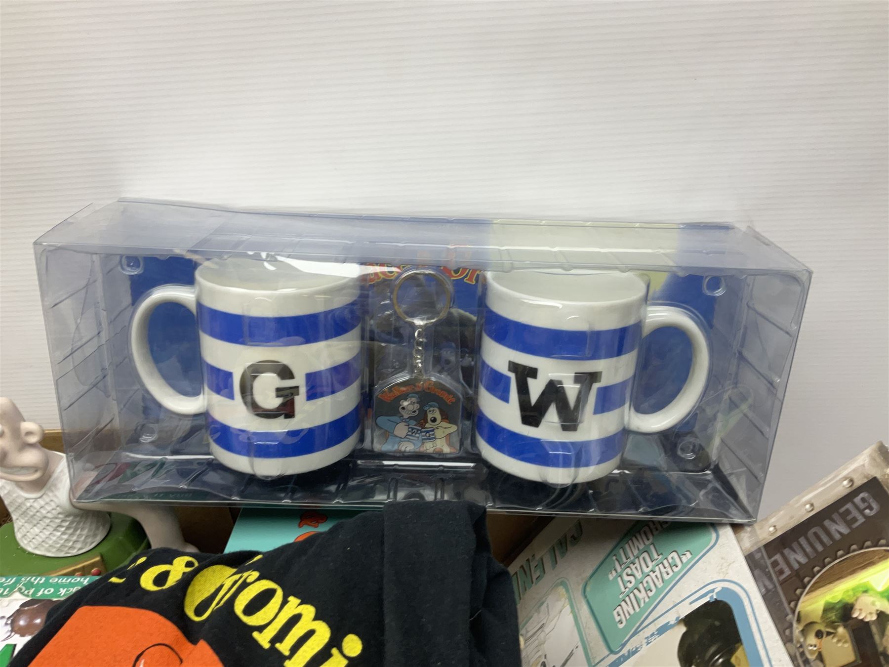 Wallace and Gromit and Shaun the Sheep collectables, including alarm clocks, plates, cafetiere, soft toys, etc, in two boxes