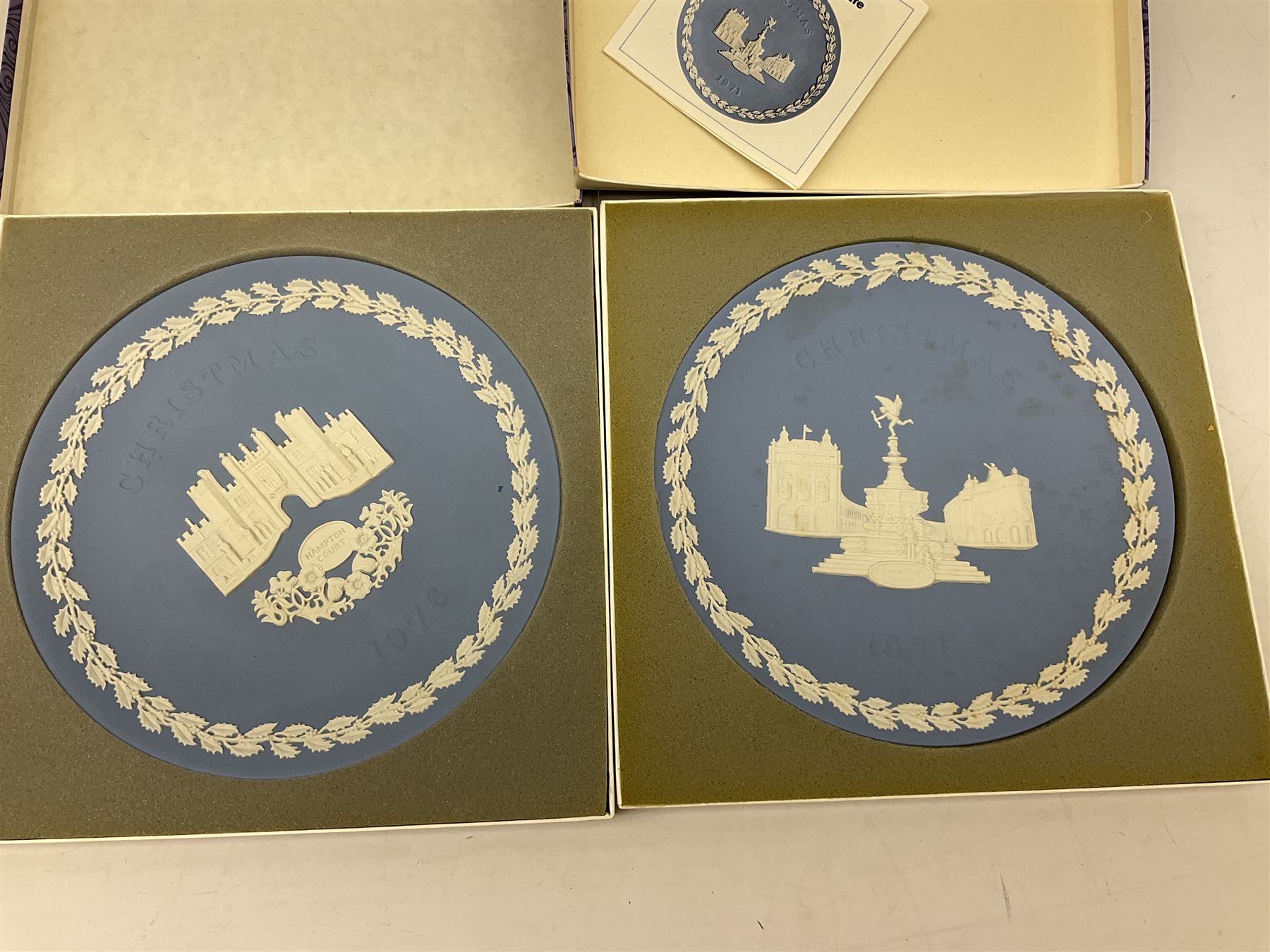 Eleven Wedgwood Jasperware Christmas collectors plates London Landmarks, comprising 1969 Windsor Castle, 1970 Trafalgar Square, 1971 Piccadilly Circus, 1972 St Pauls Cathedral, 1973 Tower of London, 1974 House of Parliament, 1975 Tower Bridge, 1976 Hampton Court, 1977 Westminster Abbey, 1978 Horse Guards and 1979 Buckingham Palace. all in original boxes  