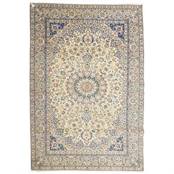 Central Persian Nain hand-knotted carpet, ivory field with central finely drawn cusped med...