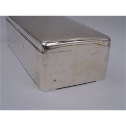 Edwardian silver mounted cigarette box, of plain rectangular form, the hinged cover with personal engraving, opening to reveal a soft wood lined compartmented interior, hallmarked Stokes & Ireland Ltd, London 1909, H6.5cm W18cm D9cm
