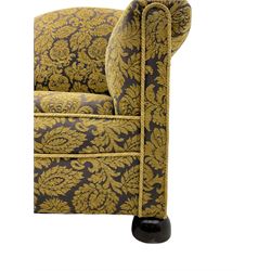 20th century armchair, upholstered in repeating foliate pattern fabric