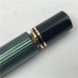 Pelikan M800 Souveran fountain pen, the green and black striped barrel with gilt beak shaped clip and double cap band with gold bi-colour nib stamped 18C-750, L13.5cm