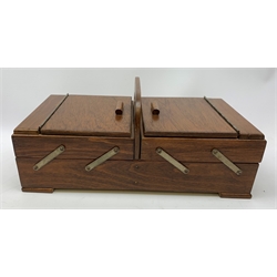  Three wooden trays, to include an oval mahogany example with inlaid shell detail to centre and two brass carry handles, L56.5cm, together with a 19th century oak tea caddy, a small 19th century mahogany box, a 20th century oak concertina sewing box, and a wooden letter rack.   