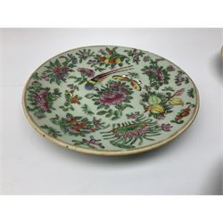 Three Chinese celadon plates decorated in the Famille Rose palette with enamelled birds, peonies and butterflies, each with seal mark to the base, approx D18cm