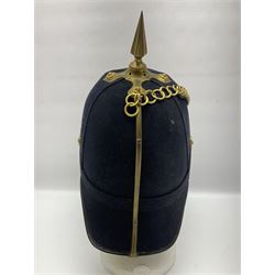 Post-1902 Welsh Regiment Officer's Home Service Blue Cloth Helmet with gilt metal King's crown helmet plate to the front, a removable spike to the top on a shaped cruciform base with rosette fittings, rosette side bosses, brass trim to the front peak, and leather and velvet backed chin scales, with sweat band, the interior with the remains of a makers label at the address 1,3 & 5 Lexington Street, Golden ? London W (presumably Hobson & Sons)