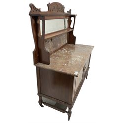 Late Victorian walnut washstand, raised back with carved pediment over bevelled mirror and marble panels, rectangular marble top, fitted with two figured panel doors, on turned supports