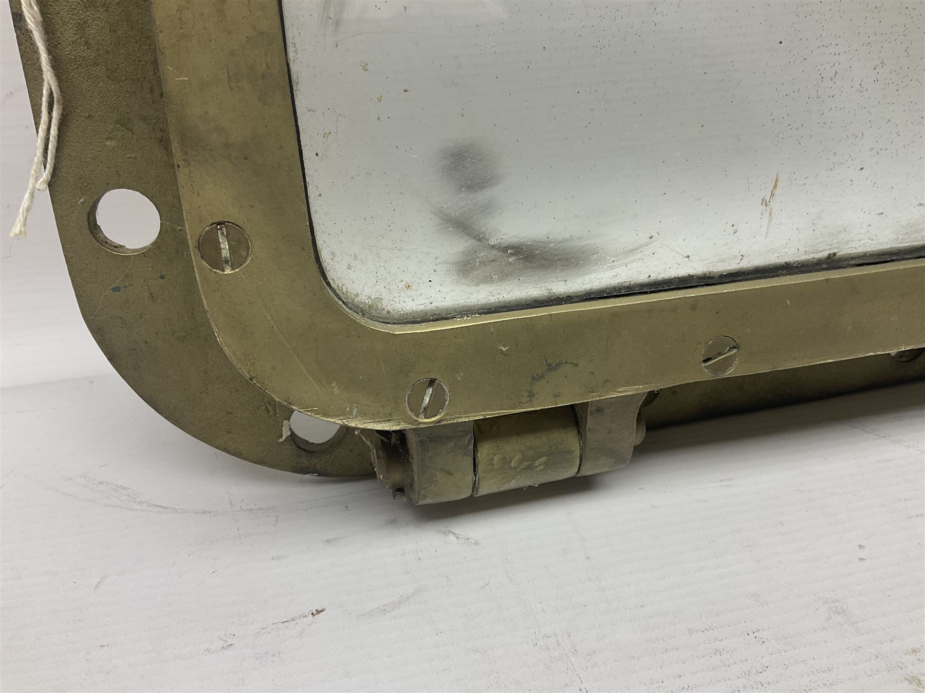 Rectangular brass porthole with hinged window, H46cm, L66cm