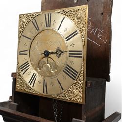 Cooper of Derby - Early 18th century 30hr oak longcase clock c1740, with a flat topped hood and plain frieze beneath, square hood door flanked by turned pilasters with wooden capitals, long trunk door with a wavy top on a square plinth with applied skirting, brass dial with cast spandrels and an engraved dial centre, chapter with Roman numerals, quarter hour markers, single steel hand and date aperture, chain driven countwheel striking movement, sounding the hours on a bell. With weight and pendulum.