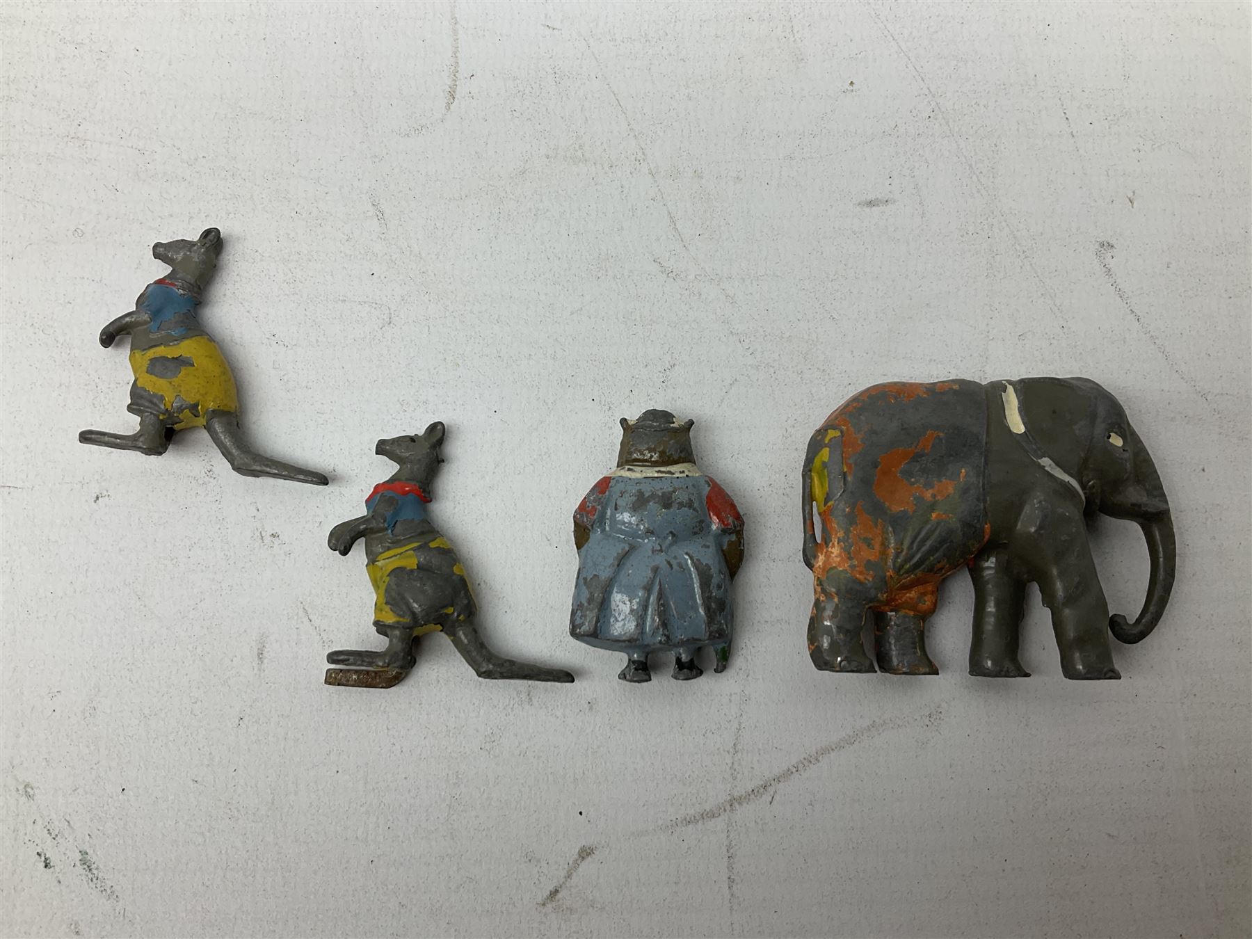 Collection of twenty-two Britains Cadbury's Cococubs play worn lead painted figures to include Mr Pie Porker, Mrs Pie Porker, Tiny Tusks, Captain Kangaroo, Granny Owl and others, Britains Snow White and Doc lead figures and other painted lead figures (30)