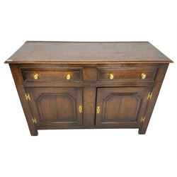 20th century Georgian design oak dresser base, moulded rectangular top over two drawers and two cupboards with fielded panels