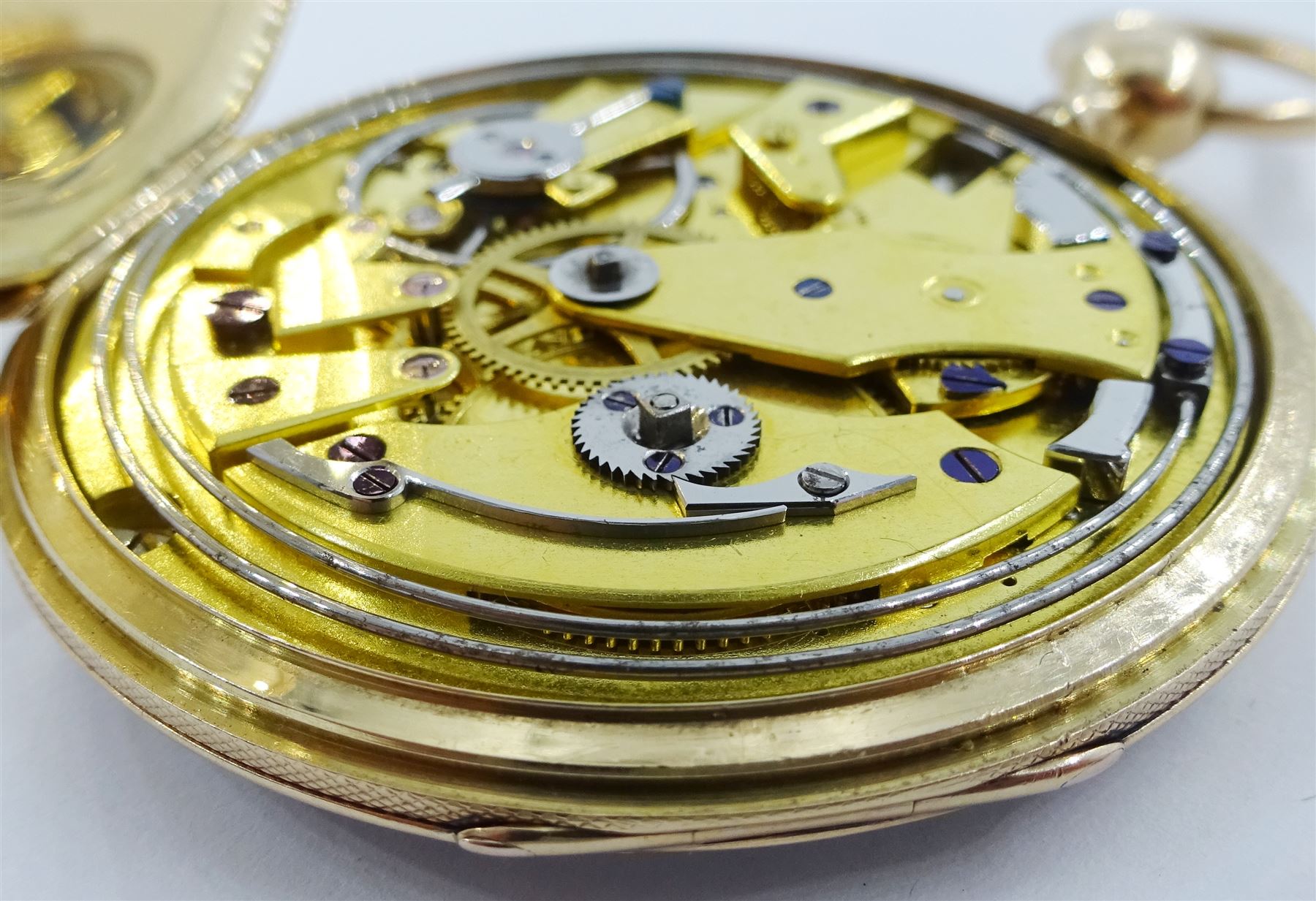18ct gold open face key wound quarter repeating Swiss lever pocket watch by Garni en Pierre, No. 5090, the gold dust cover inscribed 'Echappement Libre a Ancre', plunge repeat in the pendant, silver engine turned dial with Roman numerals and subsidiary seconds dial