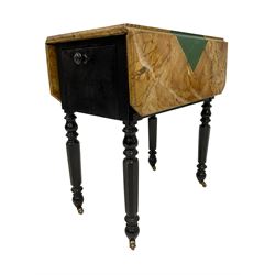 Victorian ebonised drop-leaf pot cupboard with later trompe l'oeil painted top, depicting marbled surface with baize cloth, playing cards and pencil, fitted with two drawers to one end and cupboard to the other with marble inset, on turned and faceted supports with brass castors