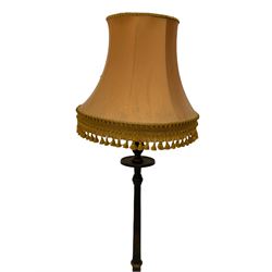 Late 20th century chinoiserie standard lamp, the circular base decorated with raised gilt figural scenes, H153cm (measurement excluding shade and fitting)