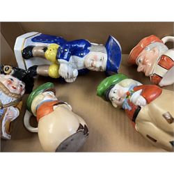 19th century ceramic toby jug with gold anchor mark to base, together with a collection of other toby jugs, tallest H21cm