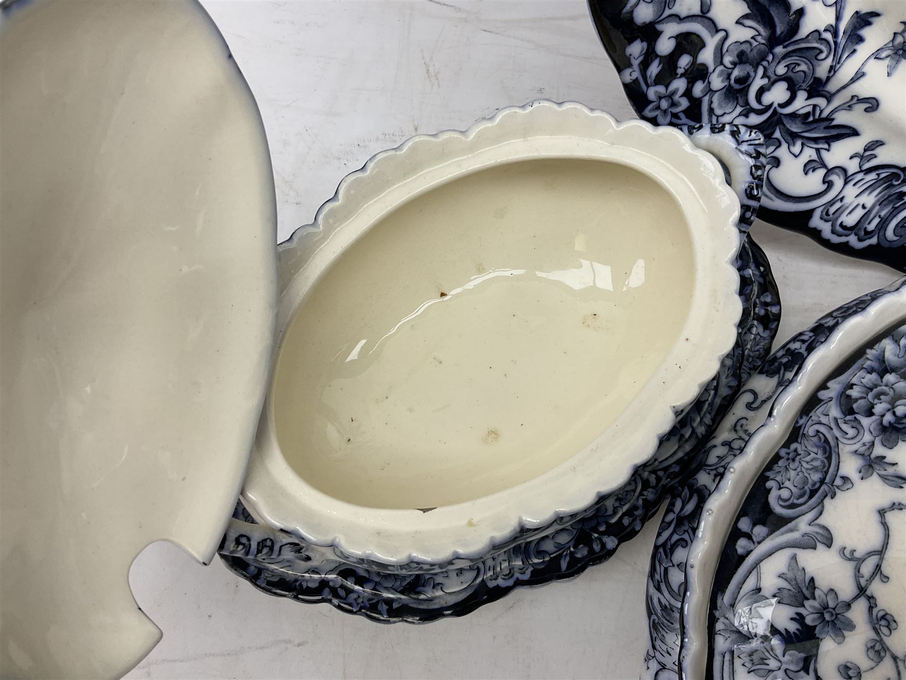 Late Victorian blue and white Chatsworth K Mayers & Co dinner wares, to include four lidded tureens, ladle, nine dinner plates, meat plate etc