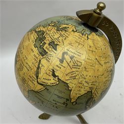 Terrestrial globe, raised on a tripod base, H30cm