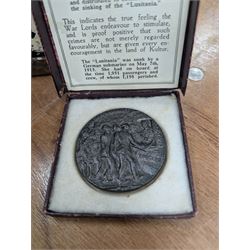 WWI brass shell case, by vendor repute salvaged from SS Cadmus wreckage site June 2007 off Flamborough Head, together with a reproduction RMS Lusitania medal in box and a metal tin