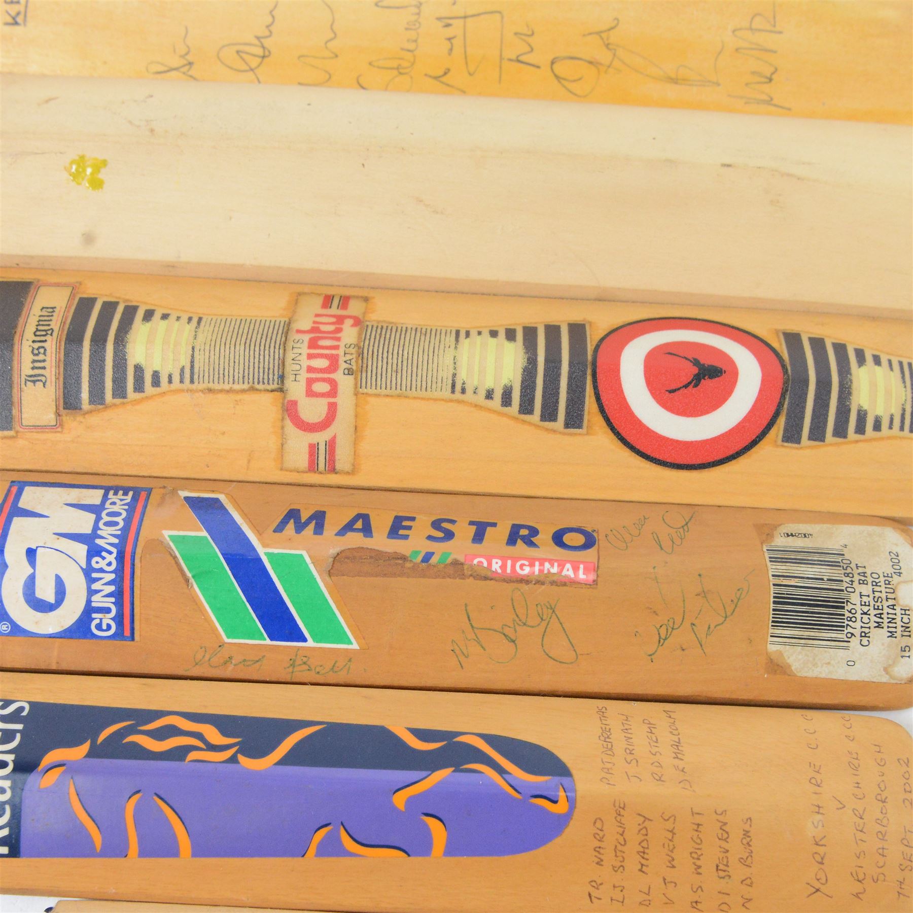 Nine signed miniature cricket bats, each signed by 1990s/2000s County Cricket teams and single players, including Paul Franks Nottinghamshire 2005  Worcestershire 1998, Derbyshire 1994, Nottinghamshire 1999 etc