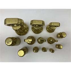 Graduated set of eight brass bell weights, together with a set of five graduating weights (13)