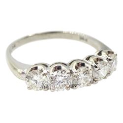 American white gold five stone diamond ring, stamped 14K by Balco Diamonds, Beverly Hills, total diamond weight 1.05 carat, with Ballreich & Co insurance certificate