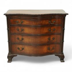 Georgian design mahogany serpentine chest, with rectangular top with floral rosette carved edge, cluster reeded columns with brush slide above four graduated drawers on ogee bracket feet 