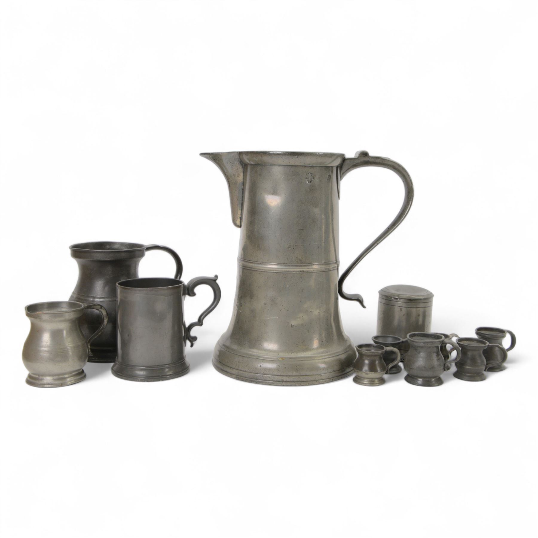19th century Pewter tavern jug, with WR beneath a crown touch mark, together with pewter tankards and measures  