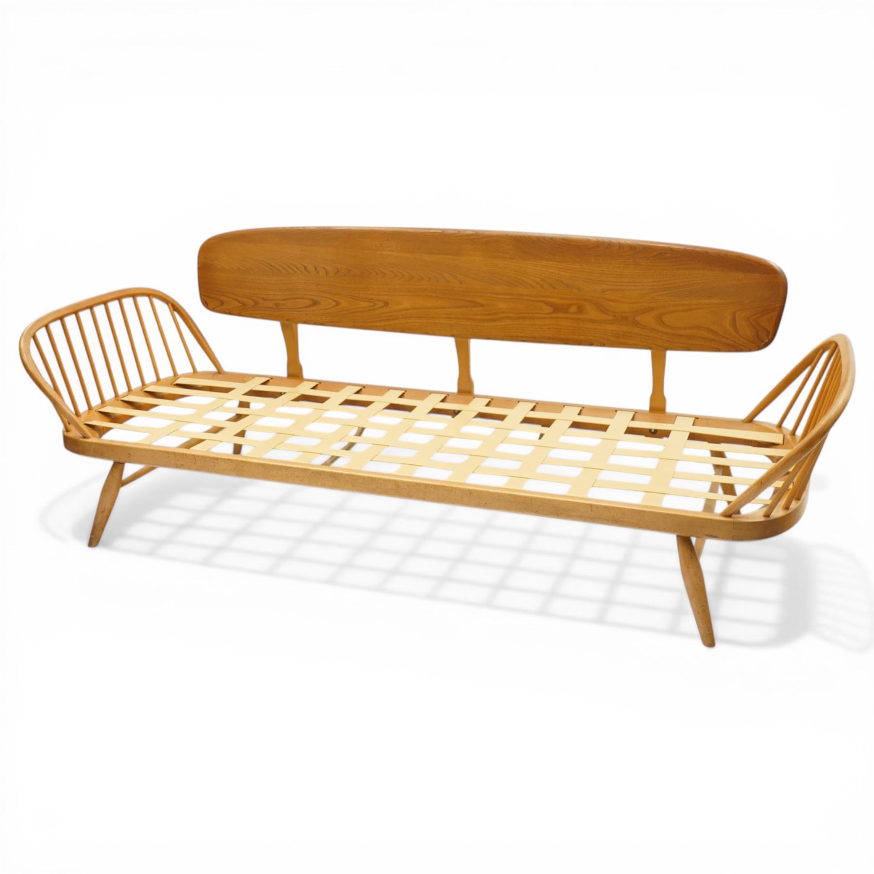 Lucian Ercolani for Ercol - 'Studio Couch' model no. 355, elm and beech framed, with loose tufted pink cushions