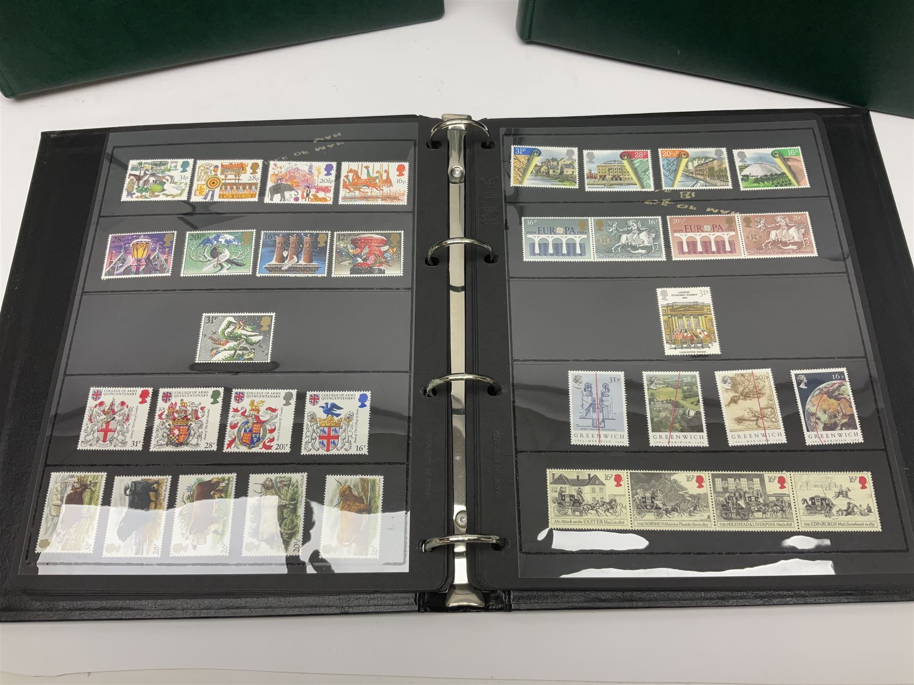 Mostly Queen Elizabeth II Great Britain and Isle of Man stamps including mint examples, housed in various albums, stockbooks and loose, in one box