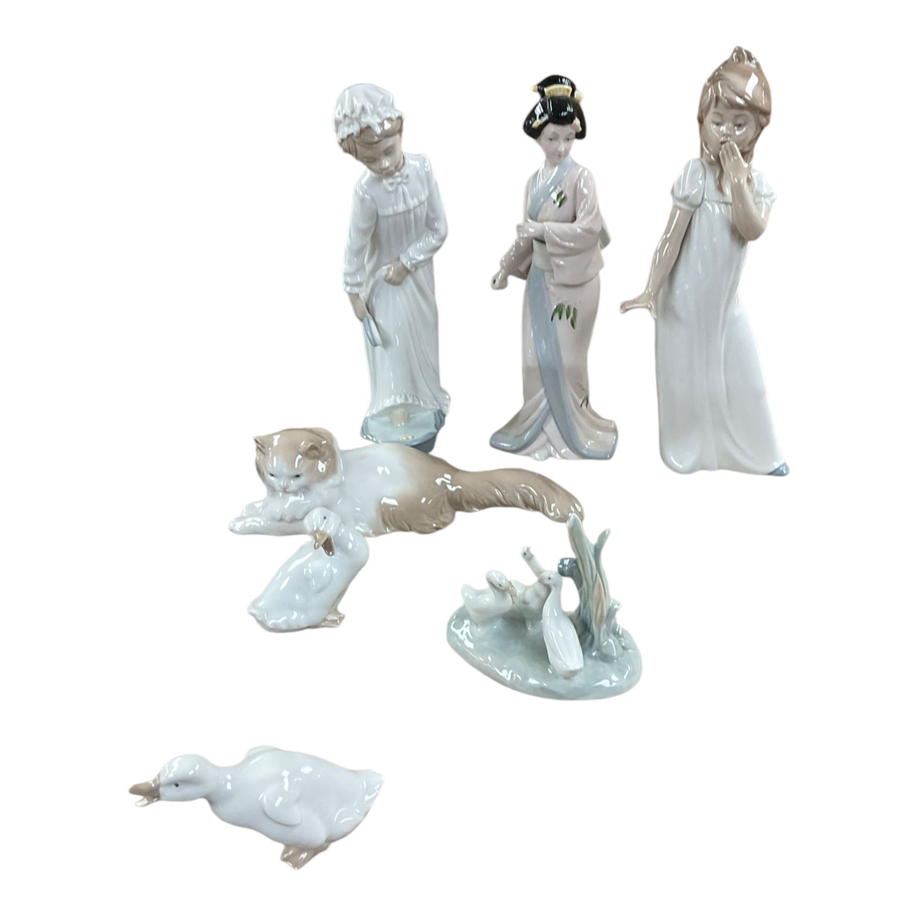 Royal Doulton Cinderella, together with five Nao figures, three boxes of Wade Whimsies etc