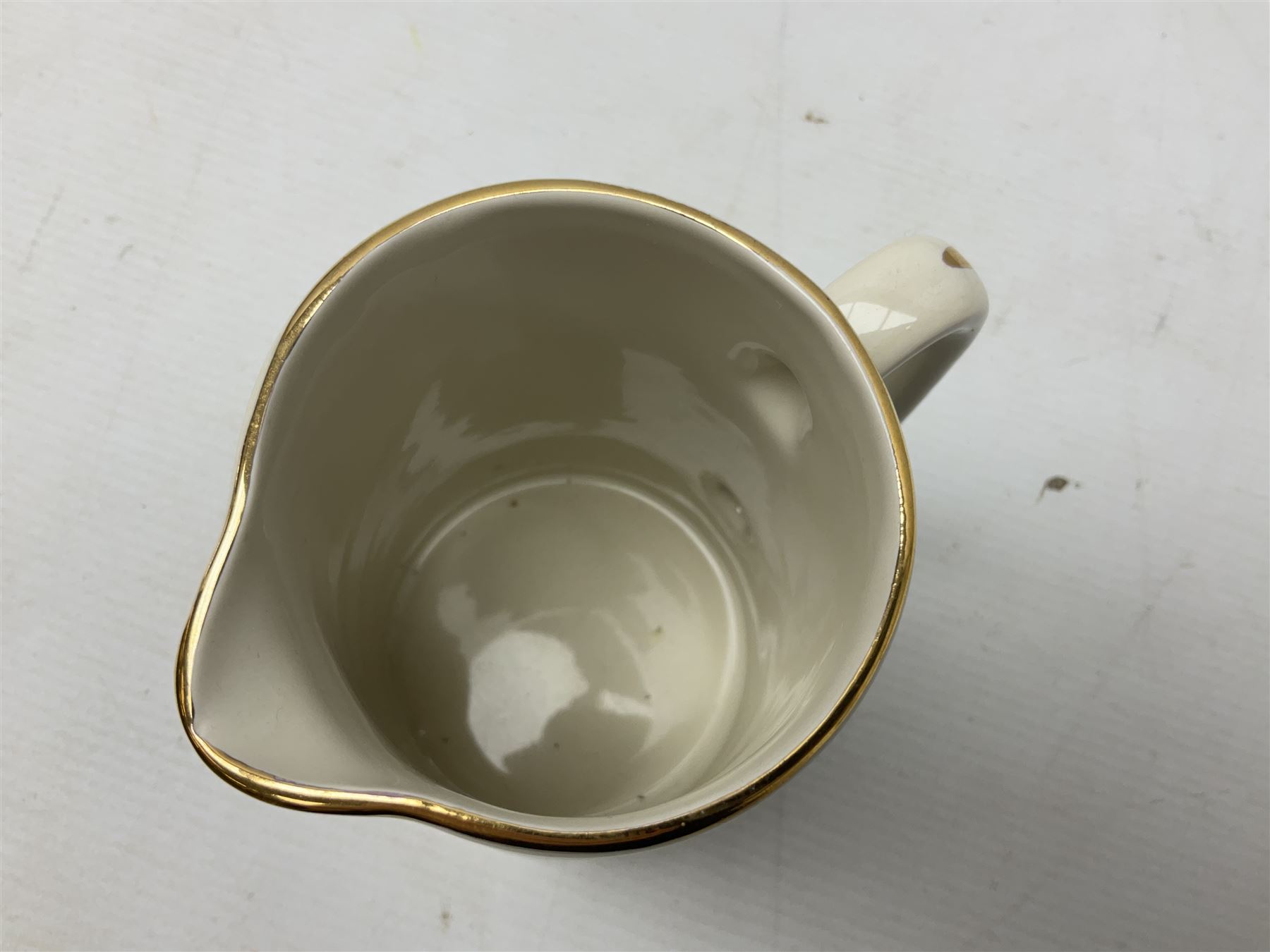 Six whisky water jugs, to include Wade Johnnie Walker, Haig, Black & White, etc