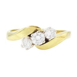 18ct gold diamond crossover ring, set three round brilliant cut diamonds, London 1991, tot...