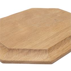 Mouseman - adzed oak bread board of canted rectangular design with carved mouse signature W30cm by the workshop of Robert Thompson, Kilburn