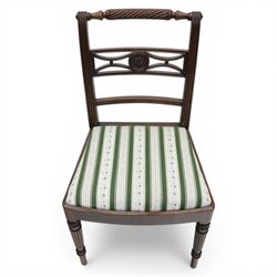 Pair of 19th century mahogany dining chairs, the wrythen top rail above a pierced splat and reeded side supports, above a white and green upholstered drop in seat, upon turned and reeded front and plain back legs