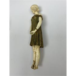 Demetre Chiparus (1886-1947): Innocence, a gilt bronze and ivory figure, circa 1925, standing in contemplative post with hands clasped, upon onyx plinth, signed to base, H24.4cm