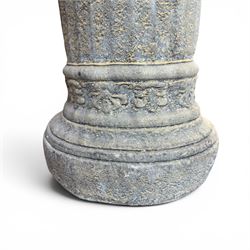 Composite garden statue group of Romeo and Juliet embracing, the couple adorned in Medieval dress standing on a naturalistic base with fallen flowers, raised on a Neoclassical fluted pedestal with Anthemion leaf motifs