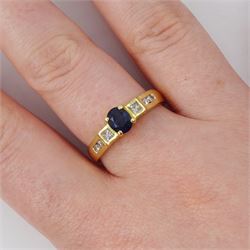 18ct gold sapphire and diamond ring, single oval cut sapphire of approx 0.70 carat, with a princess cut diamond and two round brilliant cut diamonds set either side, stamped 750, total diamond weight approx 0.20 carat