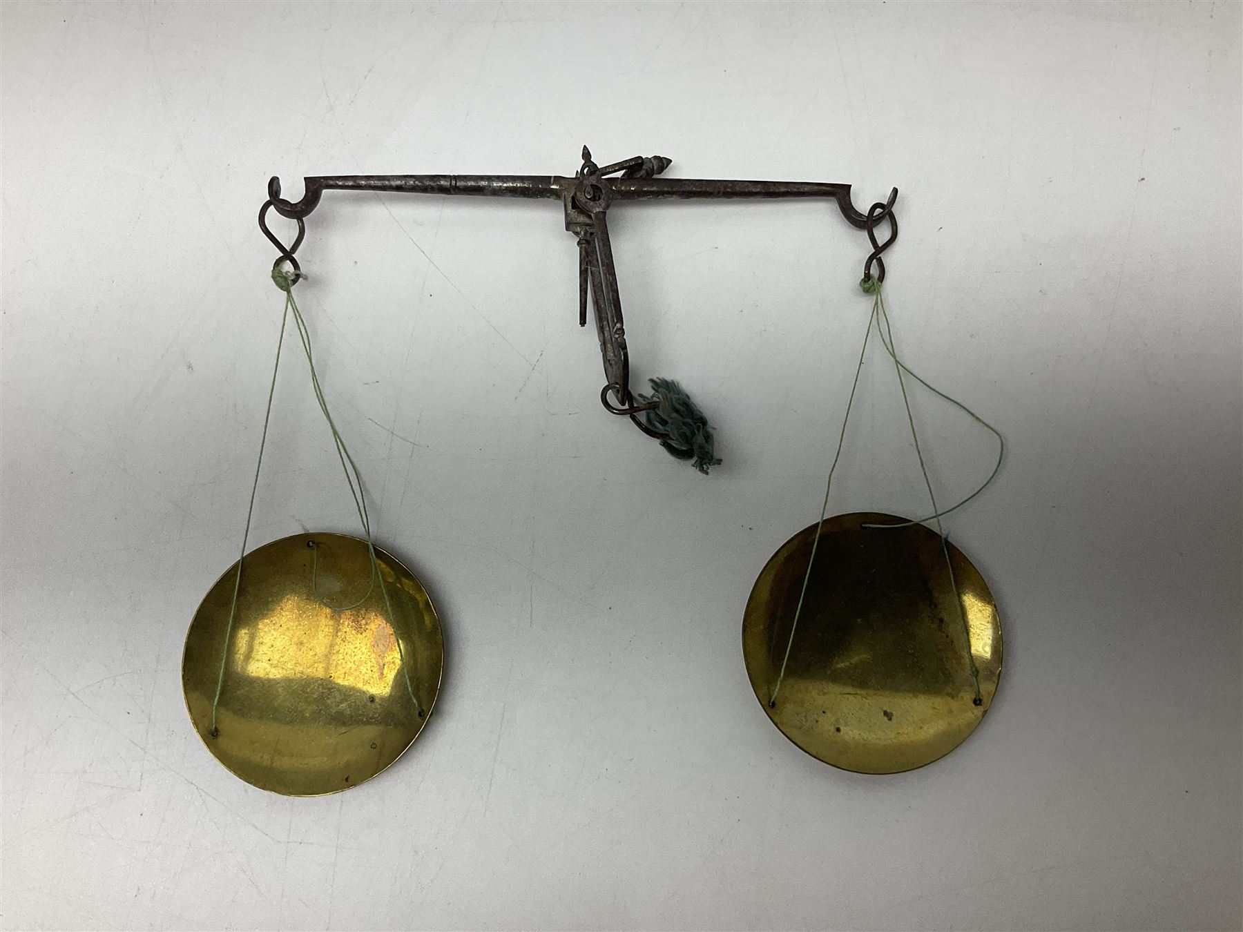 19th century apothecary leather carrying case, with key, the hinged lid opening to reveal seventeen glass medicine bottles with stoppers, most with chemist labels, gram scales, and domestic medicines booklet, H9cm, L27cm