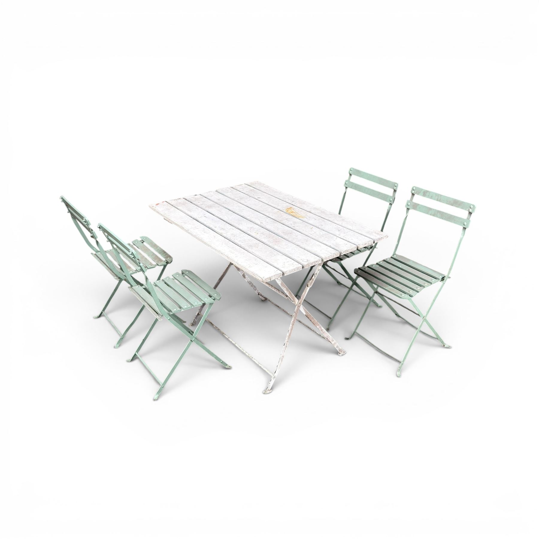 Wrought metal folding garden table, with painted wood plank top; and four matching folding chairs